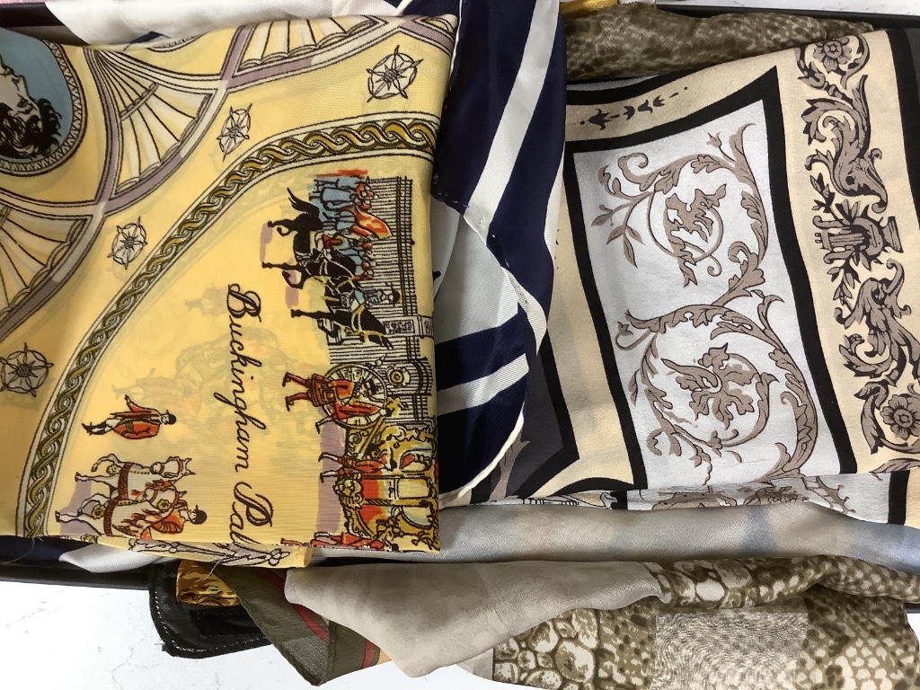 A collection of assorted late 20th century designer's silk scarves